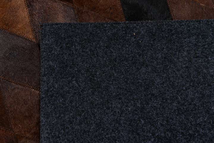 4' 8 x 6' 9 Cowhide Stocks Rug