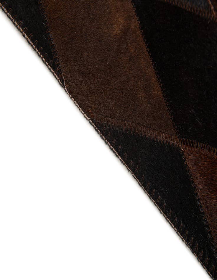 Detail image of 4' 1 x 5' 10 Cowhide Stocks Rug