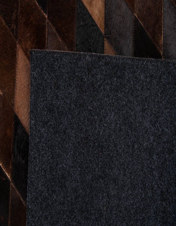 Detail image of 4' 1 x 5' 10 Cowhide Stocks Rug