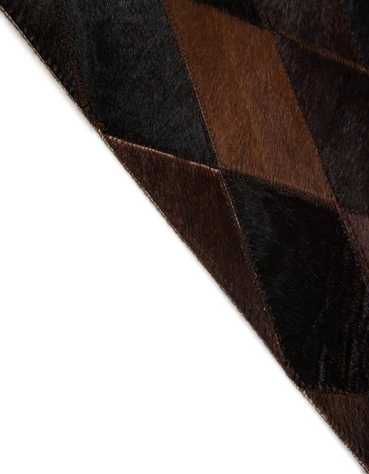Detail image of 4' 1 x 5' 9 Cowhide Stocks Rug