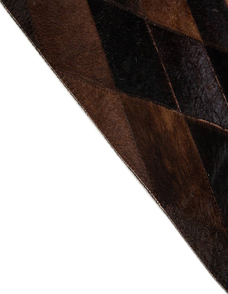 Detail image of 4' 1 x 5' 10 Cowhide Stocks Rug