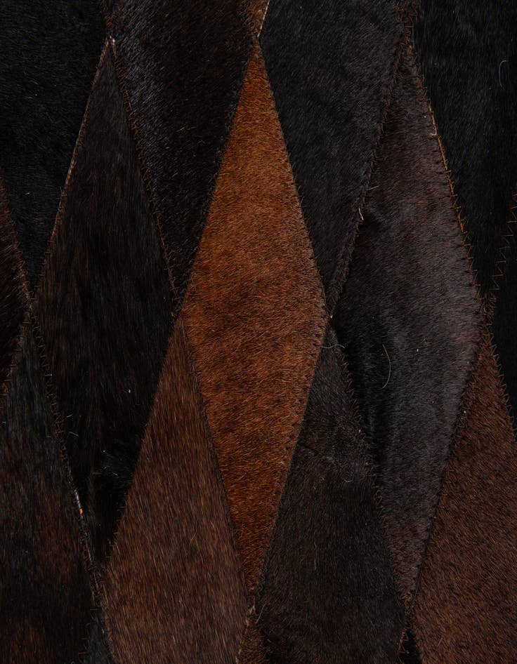 Detail image of 4' 1 x 5' 10 Cowhide Stocks Rug