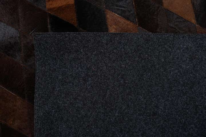 4' 1 x 5' 10 Cowhide Stocks Rug