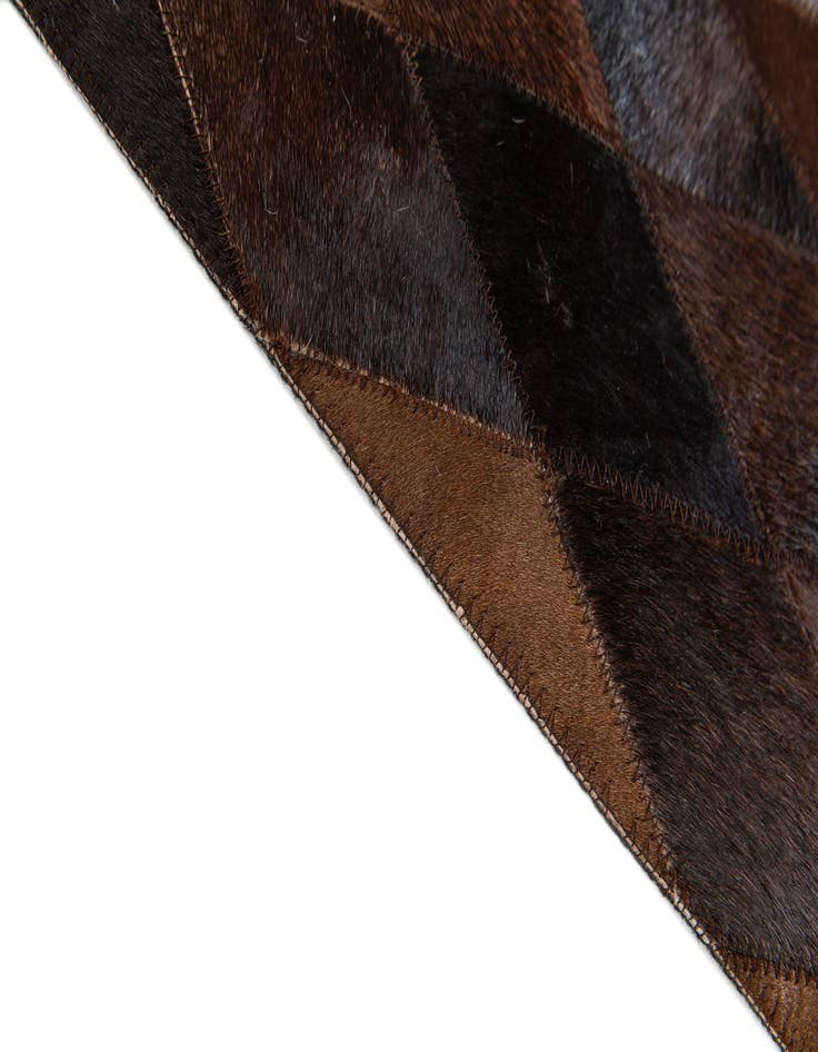 Detail image of 4' 1 x 5' 10 Cowhide Stocks Rug