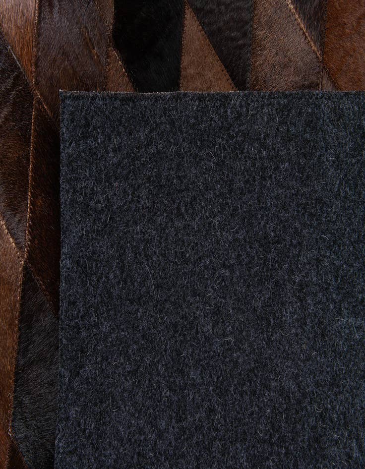 Detail image of 4' 1 x 5' 10 Cowhide Stocks Rug