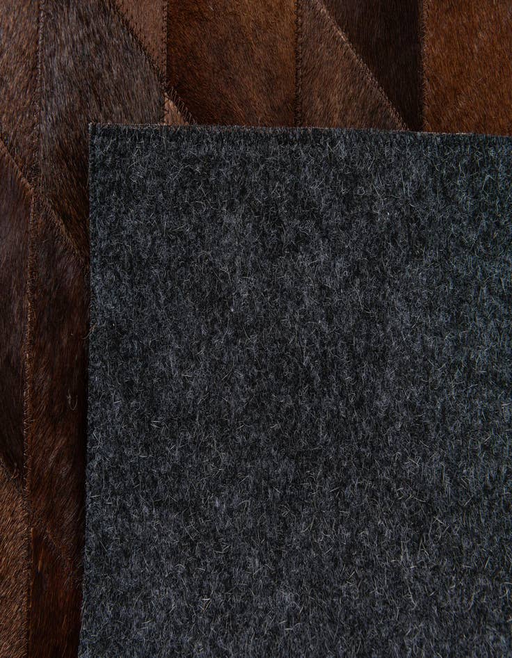 Detail image of 4' 1 x 5' 10 Cowhide Stocks Rug