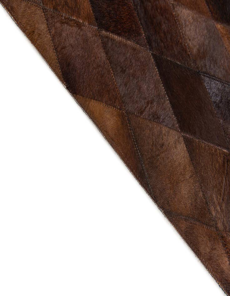 Detail image of 4' 1 x 5' 11 Cowhide Stocks Rug