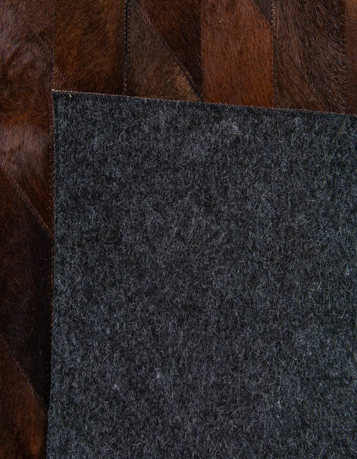 Detail image of 4' 1 x 5' 10 Cowhide Stocks Rug