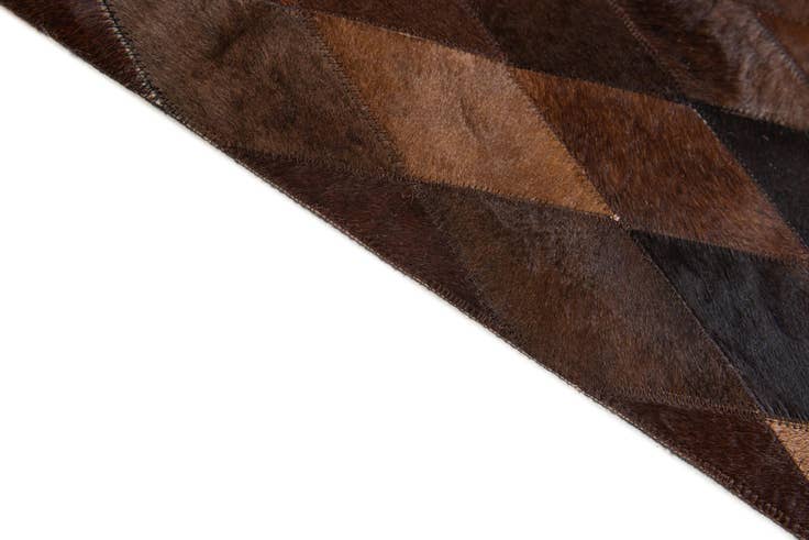 Detail image of 4' 1 x 5' 11 Cowhide Stocks Rug