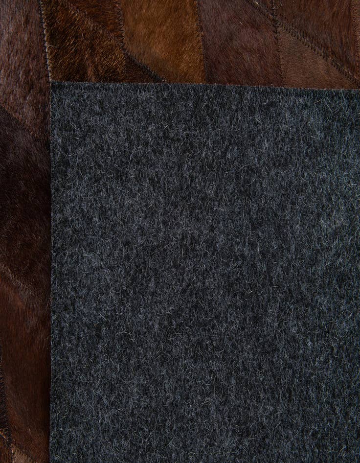 Detail image of 4' 1 x 5' 11 Cowhide Stocks Rug