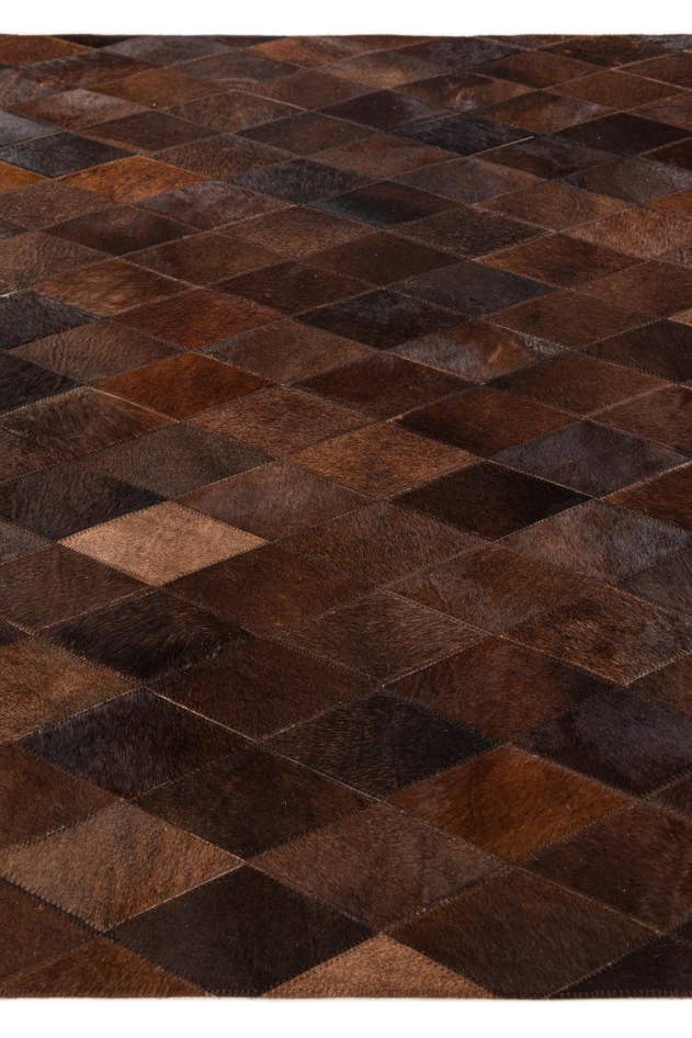 Detail image of 4' 1 x 5' 11 Cowhide Stocks Rug
