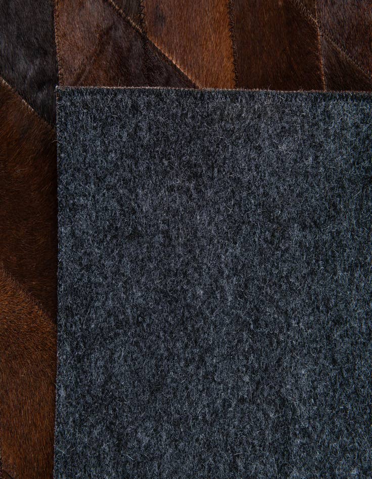 Detail image of 4' 1 x 5' 11 Cowhide Stocks Rug