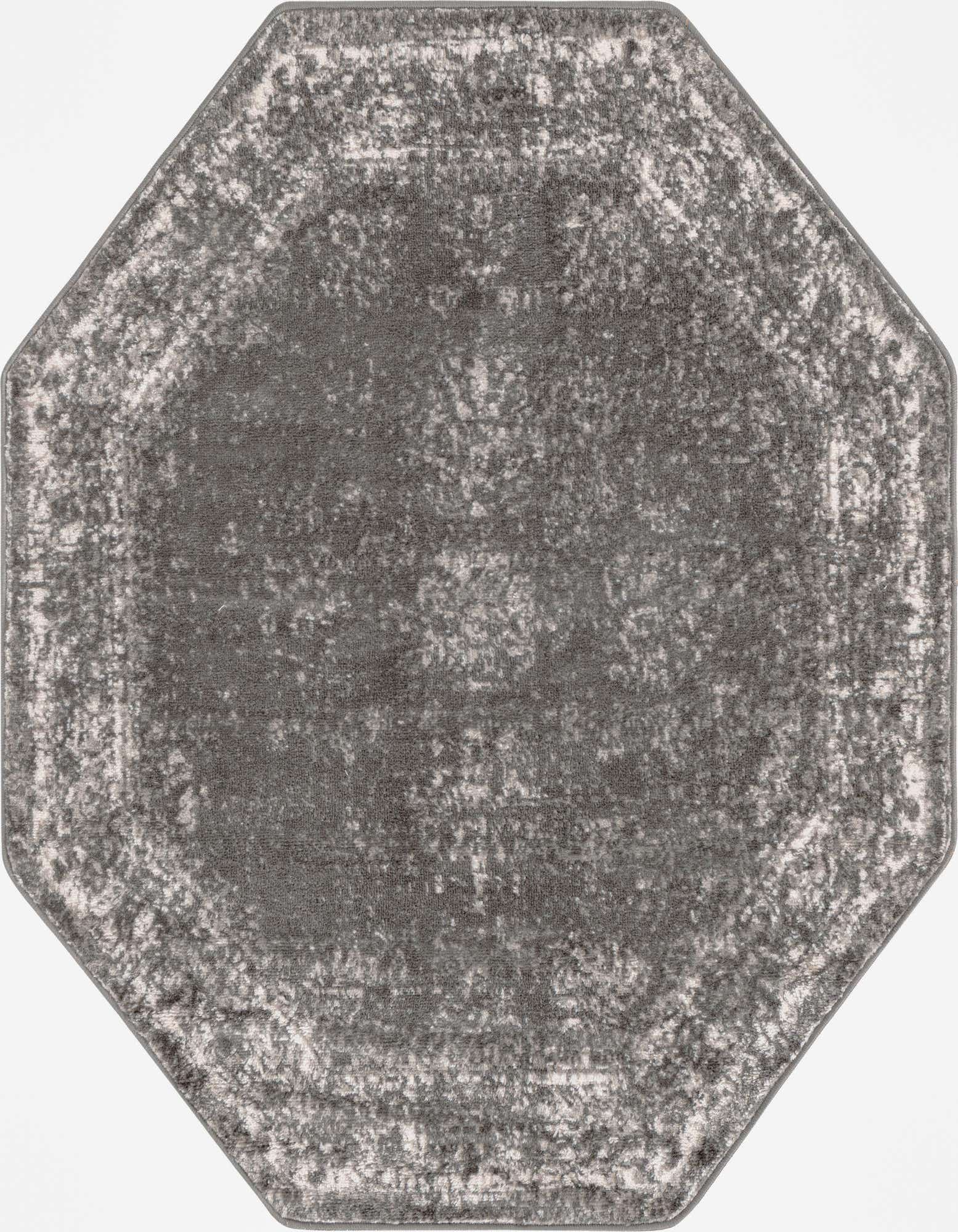 Octagon-shaped gray and silver bohemian rug with a distressed medallion pattern, ideal for an indoor living space.
