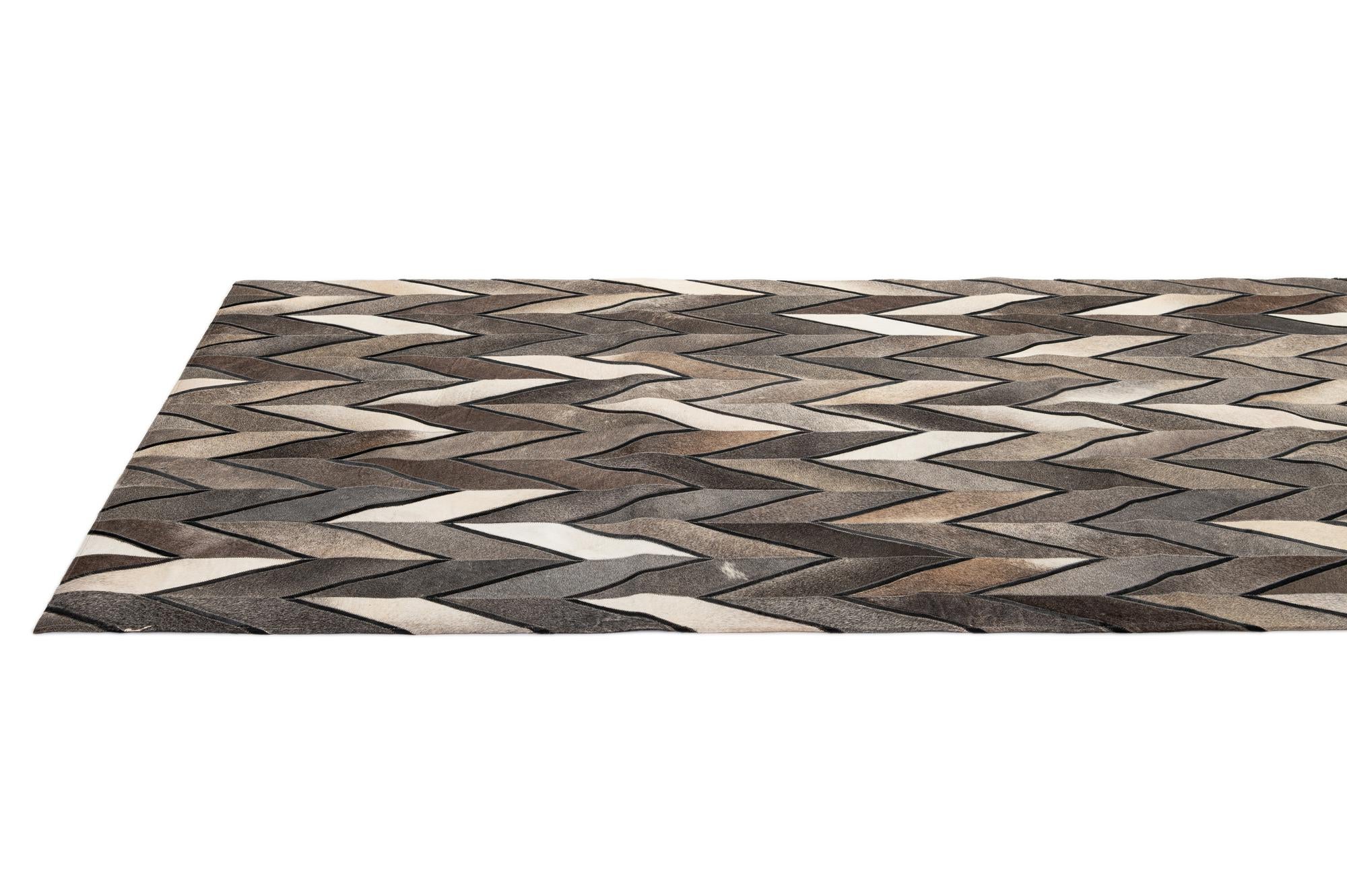 5' 2 x 8' 1 Cowhide - Patchwork Rug