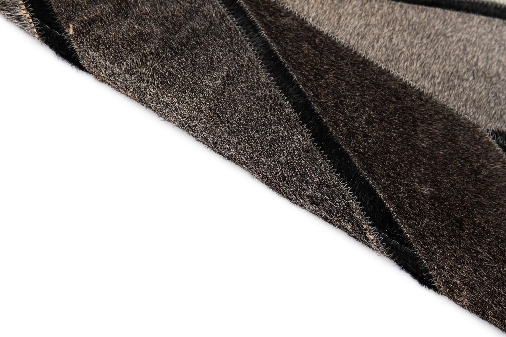 5' 2 x 8' 1 Cowhide - Patchwork Rug