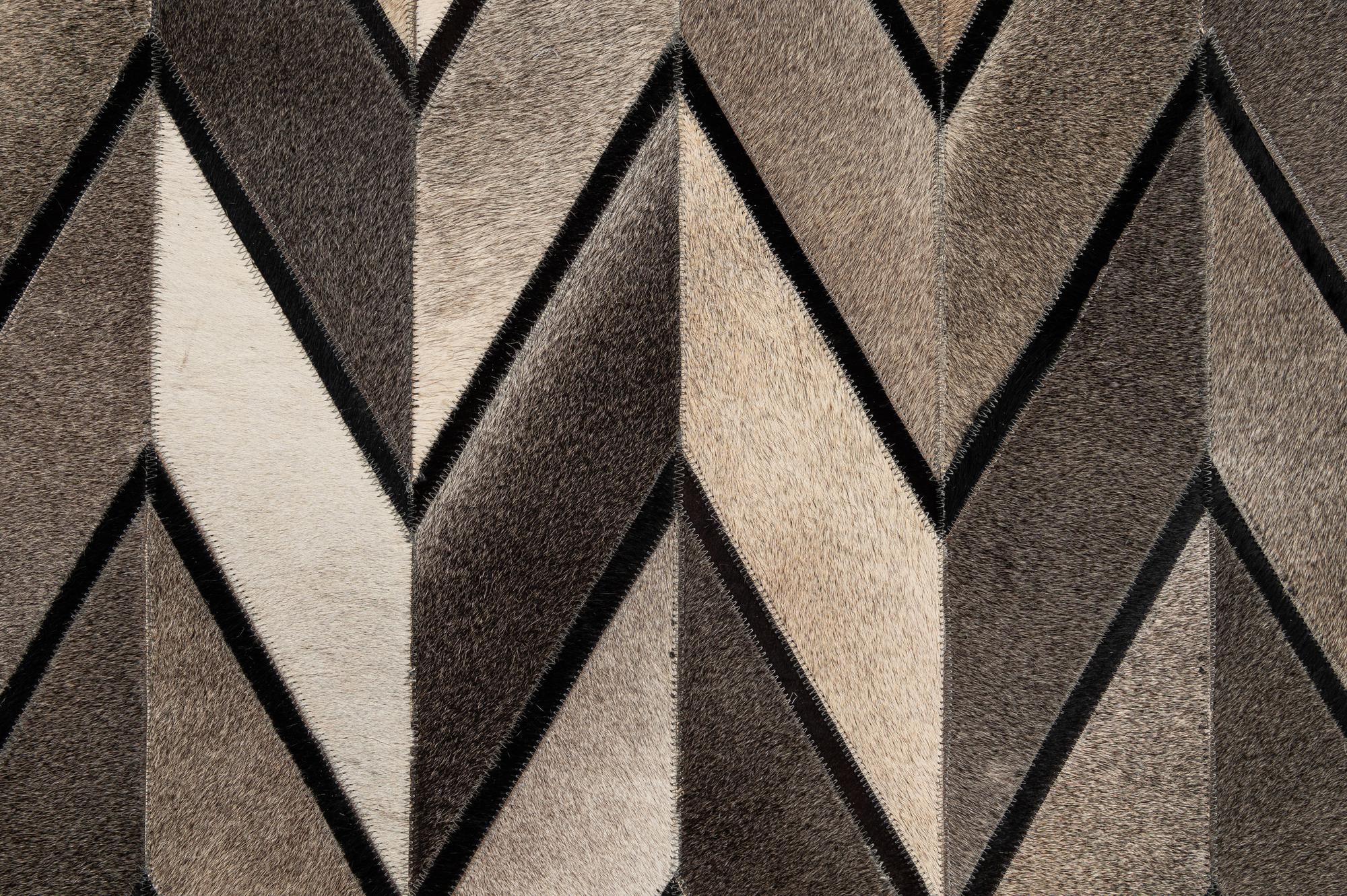 5' 2 x 8' 1 Cowhide - Patchwork Rug