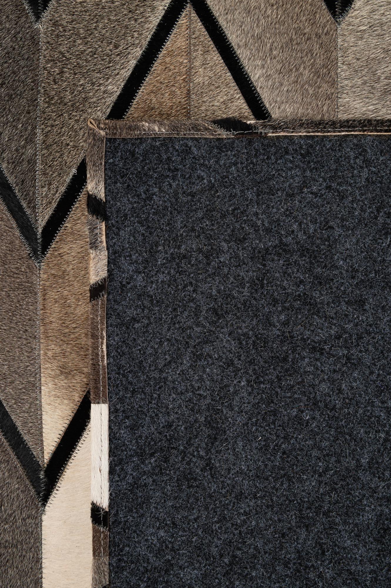 5' 2 x 8' 1 Cowhide - Patchwork Rug