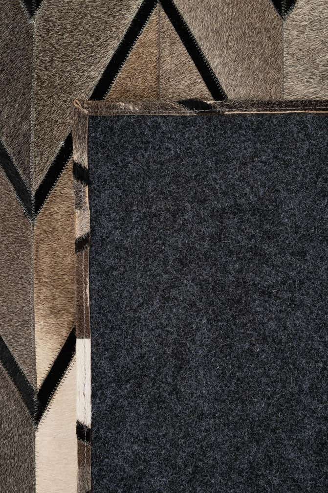 5' 2 x 8' 1 Cowhide - Patchwork Rug