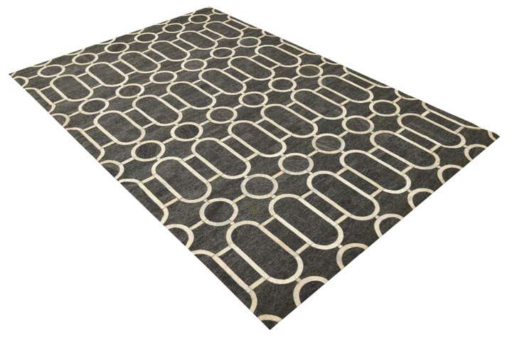5' 5 x 8' 1 Cowhide Rug