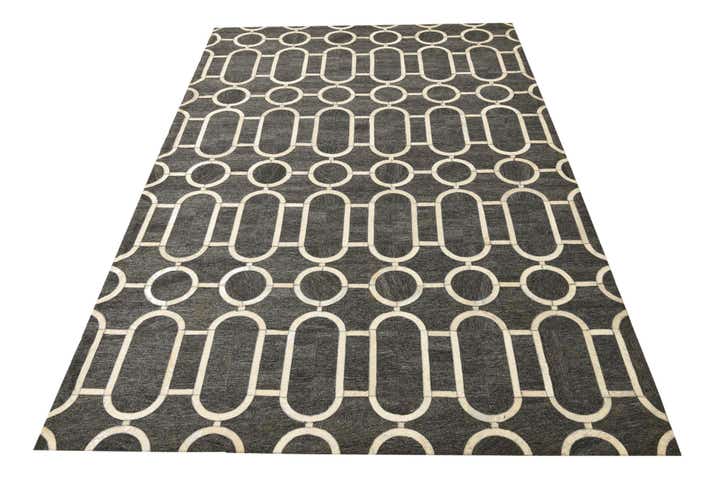 5' 5 x 8' 1 Cowhide Rug