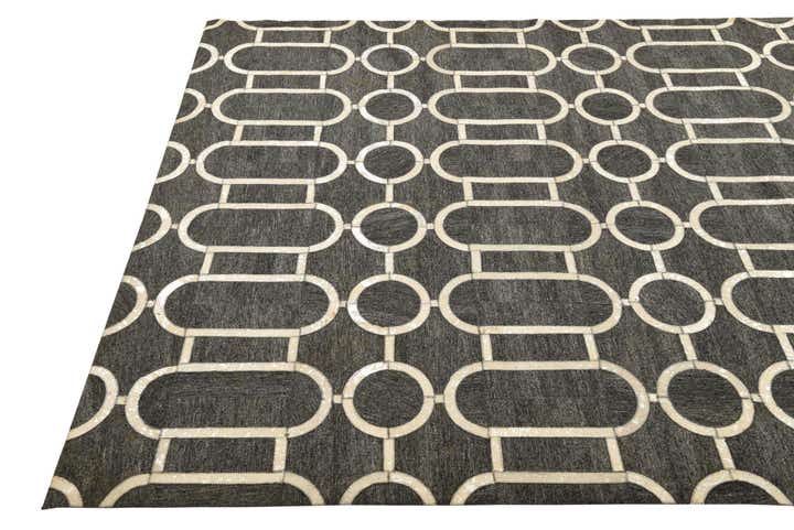 5' 5 x 8' 1 Cowhide Rug