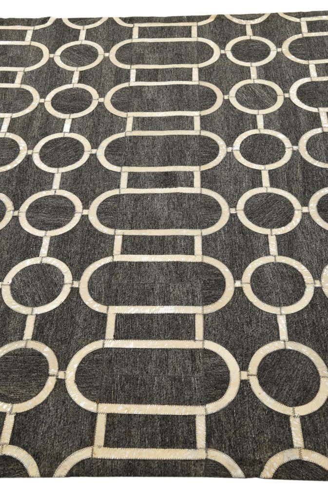 5' 5 x 8' 1 Cowhide Rug