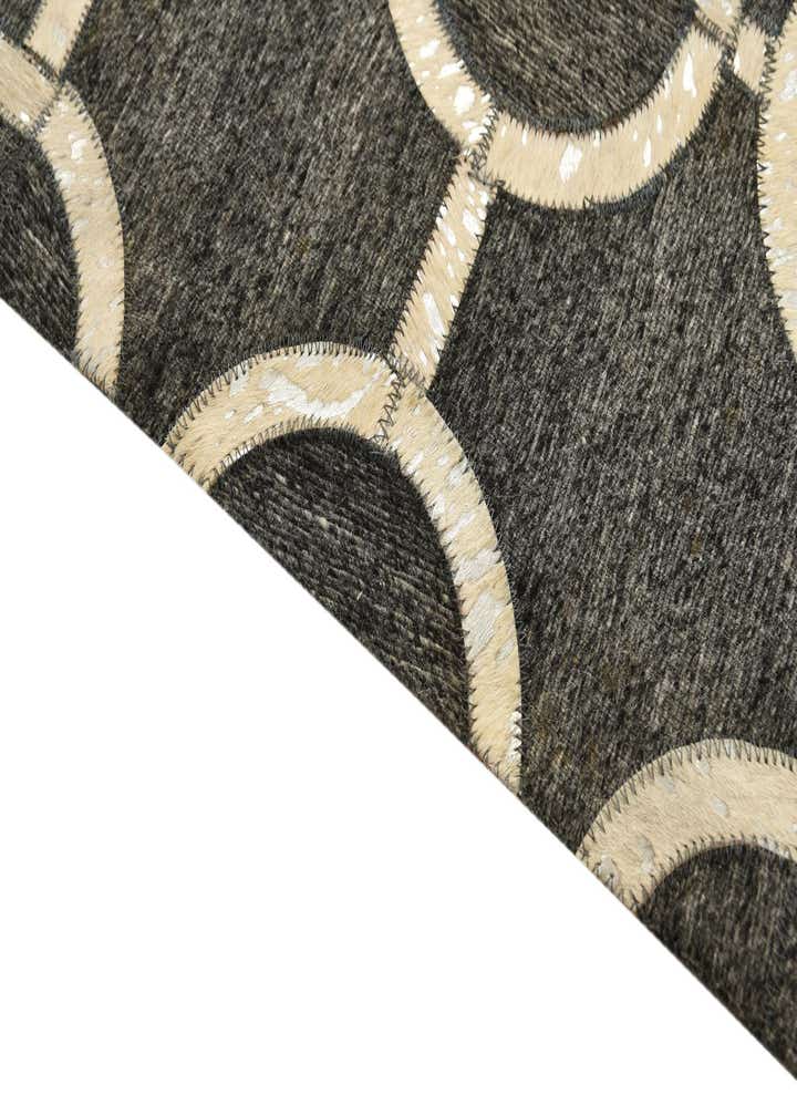 5' 5 x 8' 1 Cowhide Rug