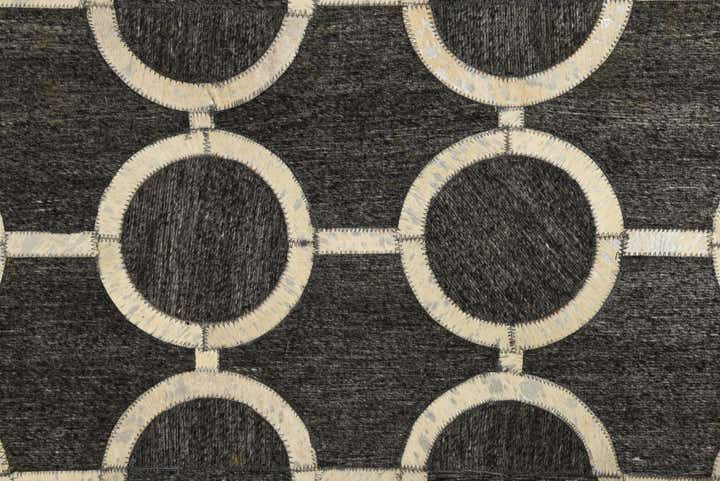 5' 5 x 8' 1 Cowhide Rug