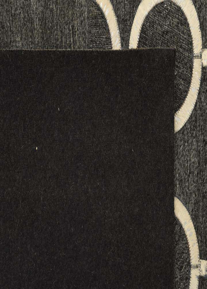 5' 5 x 8' 1 Cowhide Rug