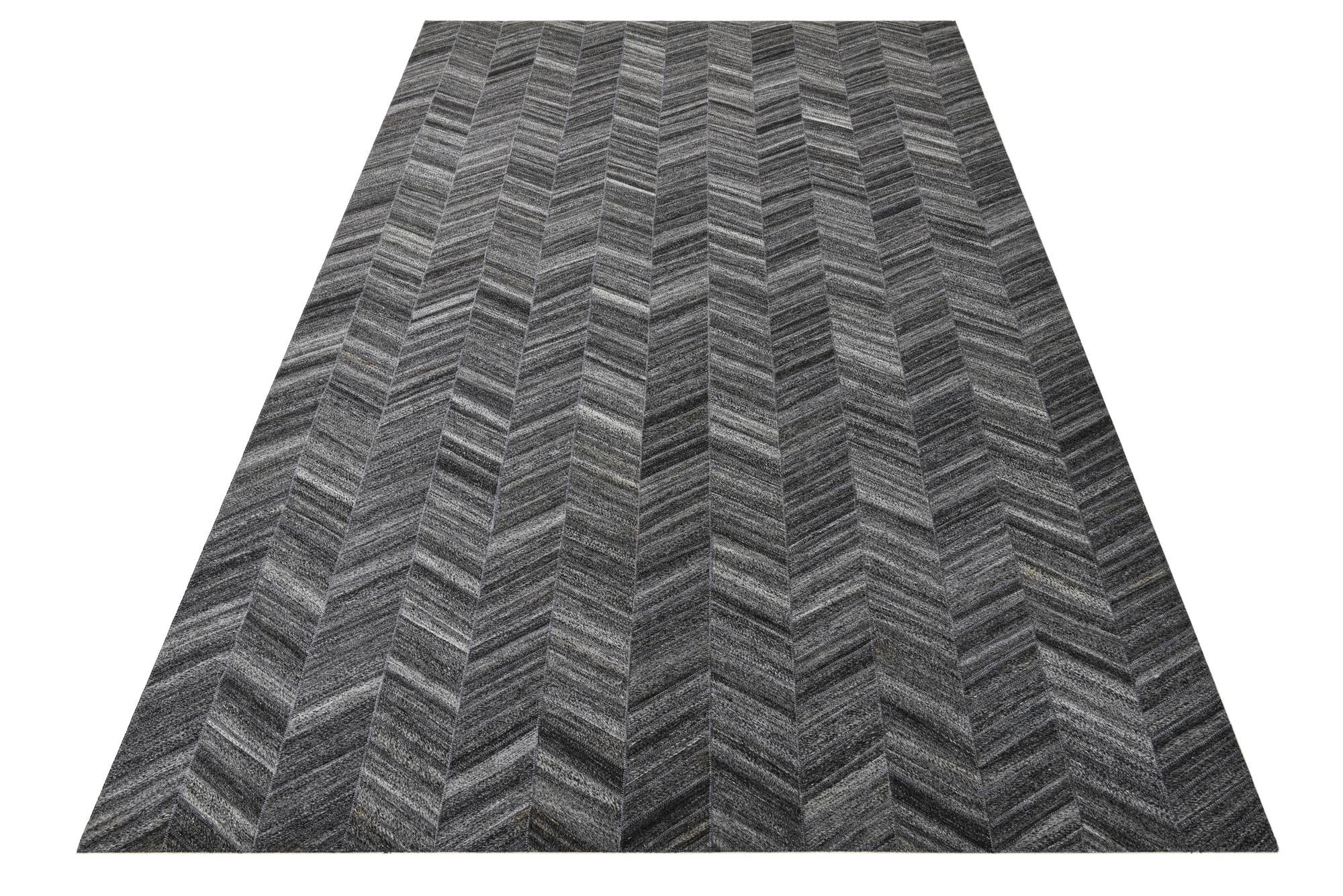 5' 2 x 8' 1 Cowhide Rug