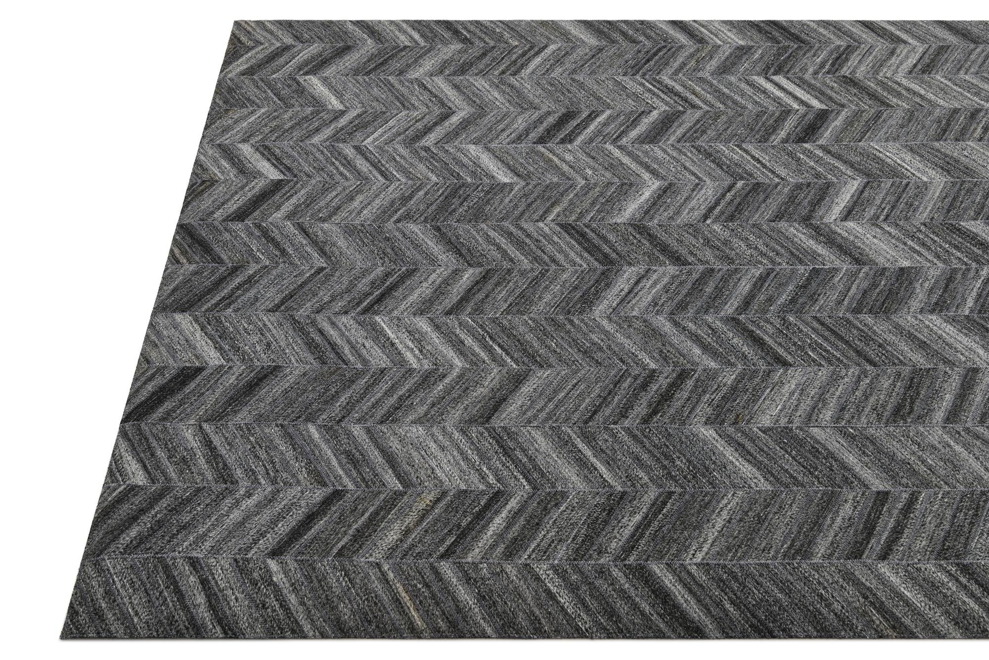 5' 2 x 8' 1 Cowhide Rug