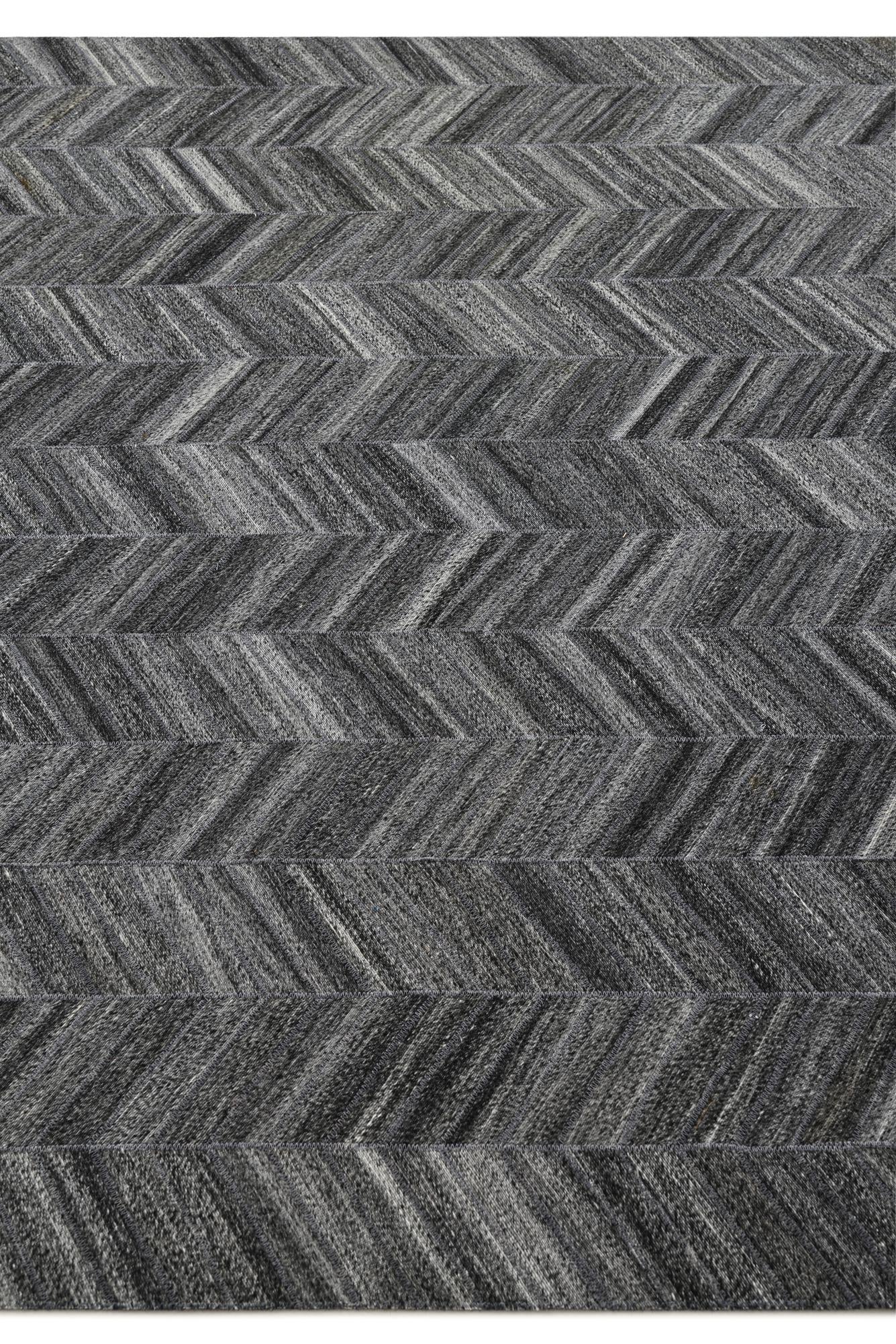 5' 2 x 8' 1 Cowhide Rug