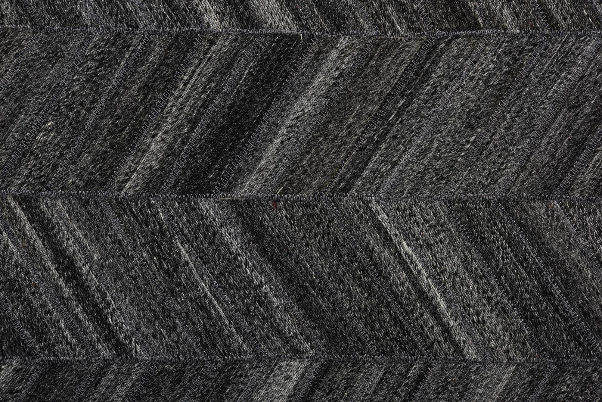 5' 2 x 8' 1 Cowhide Rug
