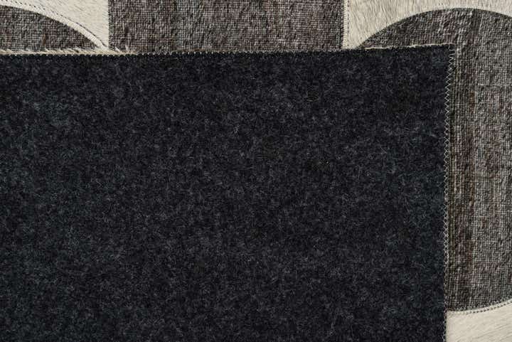 5' 3 x 8' Cowhide Rug
