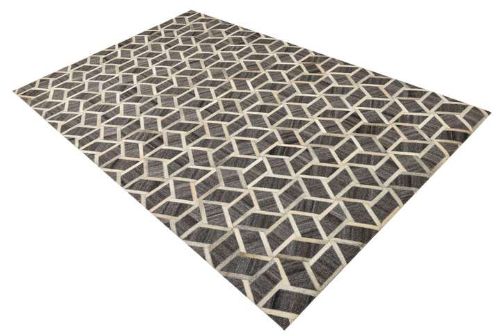 5' 1 x 8' 2 Cowhide Rug