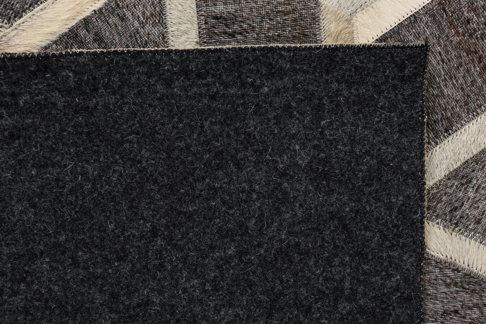 5' 1 x 8' 2 Cowhide Rug