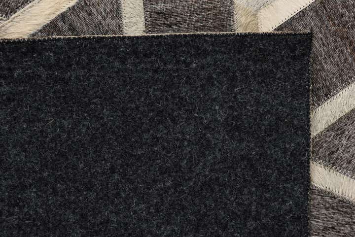5' 1 x 8' 2 Cowhide Rug