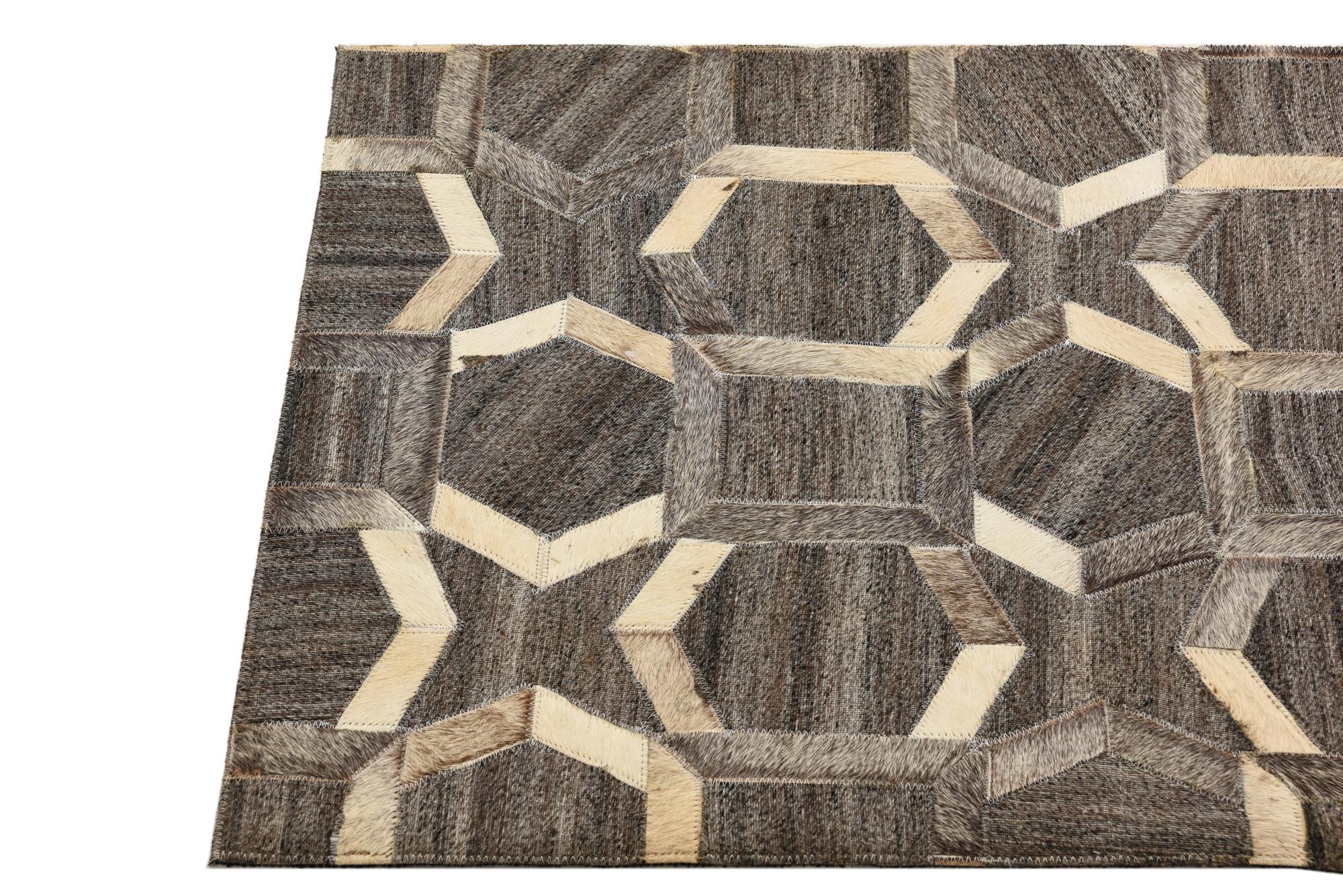2' 2 x 3' 1 Cowhide Rug