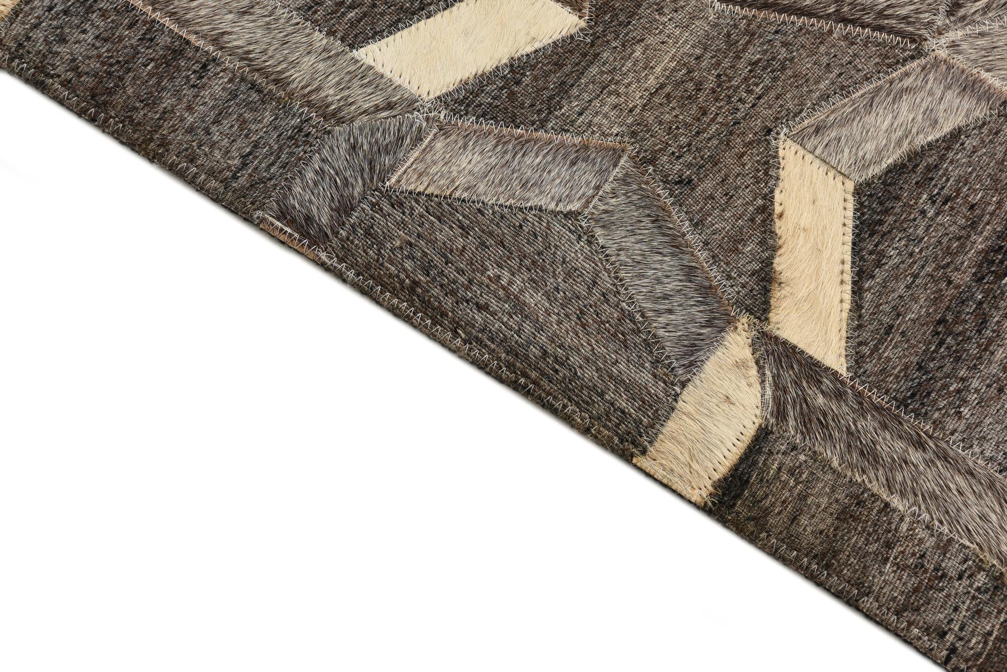2' 2 x 3' 1 Cowhide Rug