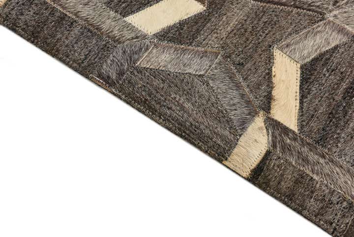 2' 2 x 3' 1 Cowhide Rug