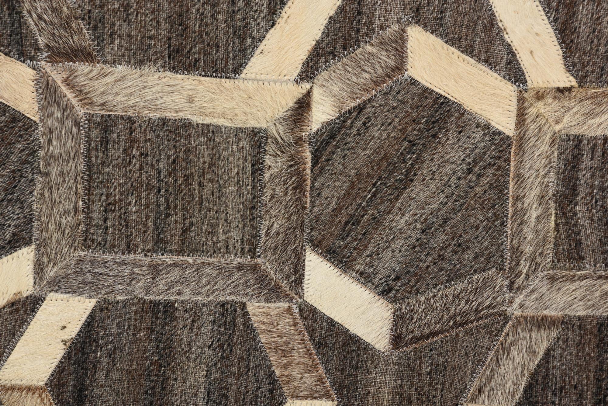 2' 2 x 3' 1 Cowhide Rug