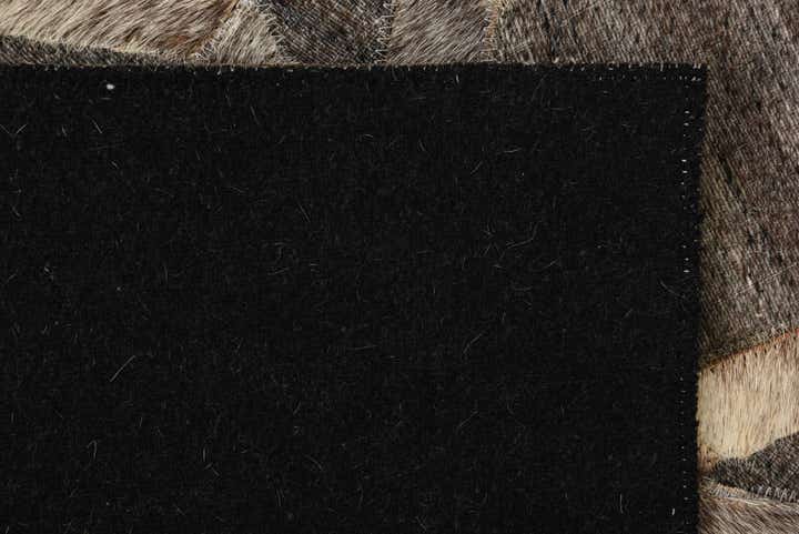 2' 2 x 3' 1 Cowhide Rug
