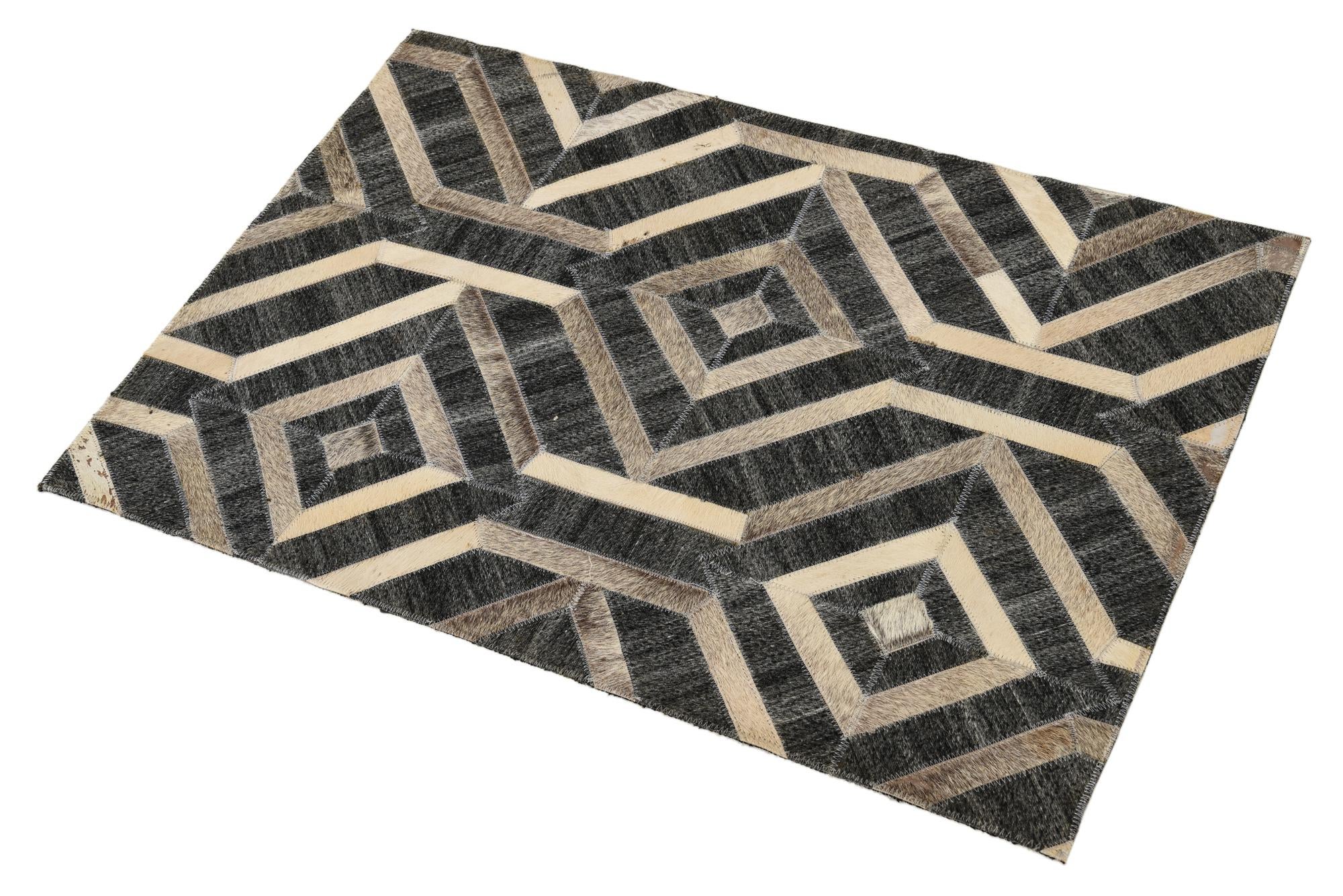 2' 2 x 3' 1 Cowhide Rug