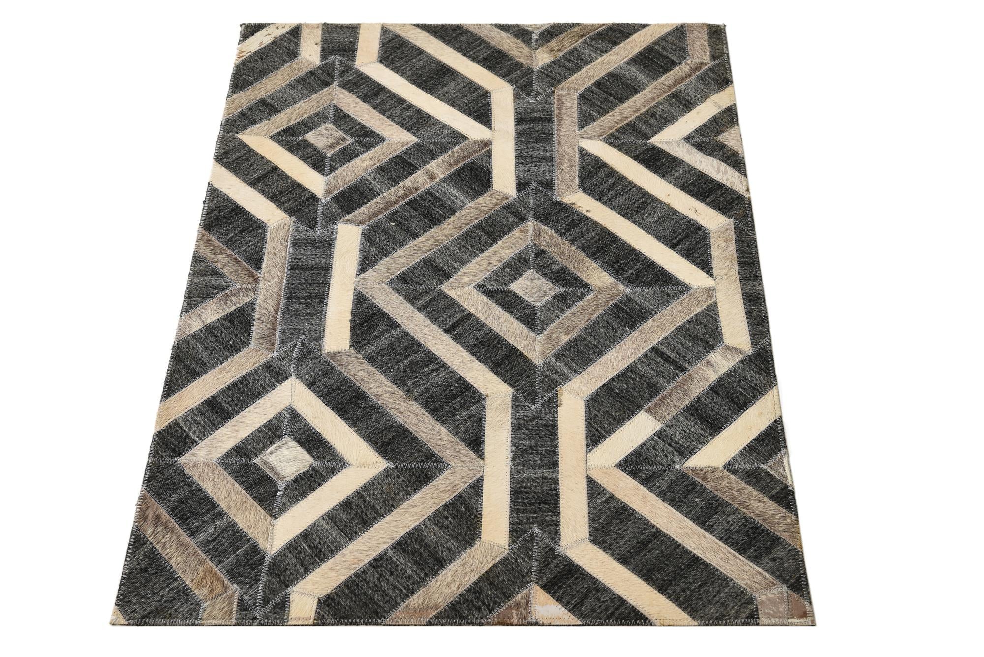 2' 2 x 3' 1 Cowhide Rug