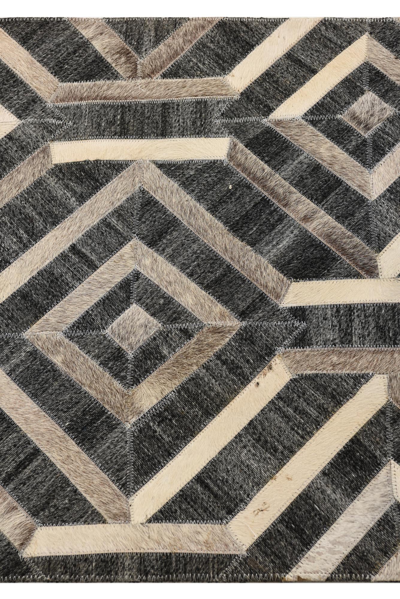 2' 2 x 3' 1 Cowhide Rug