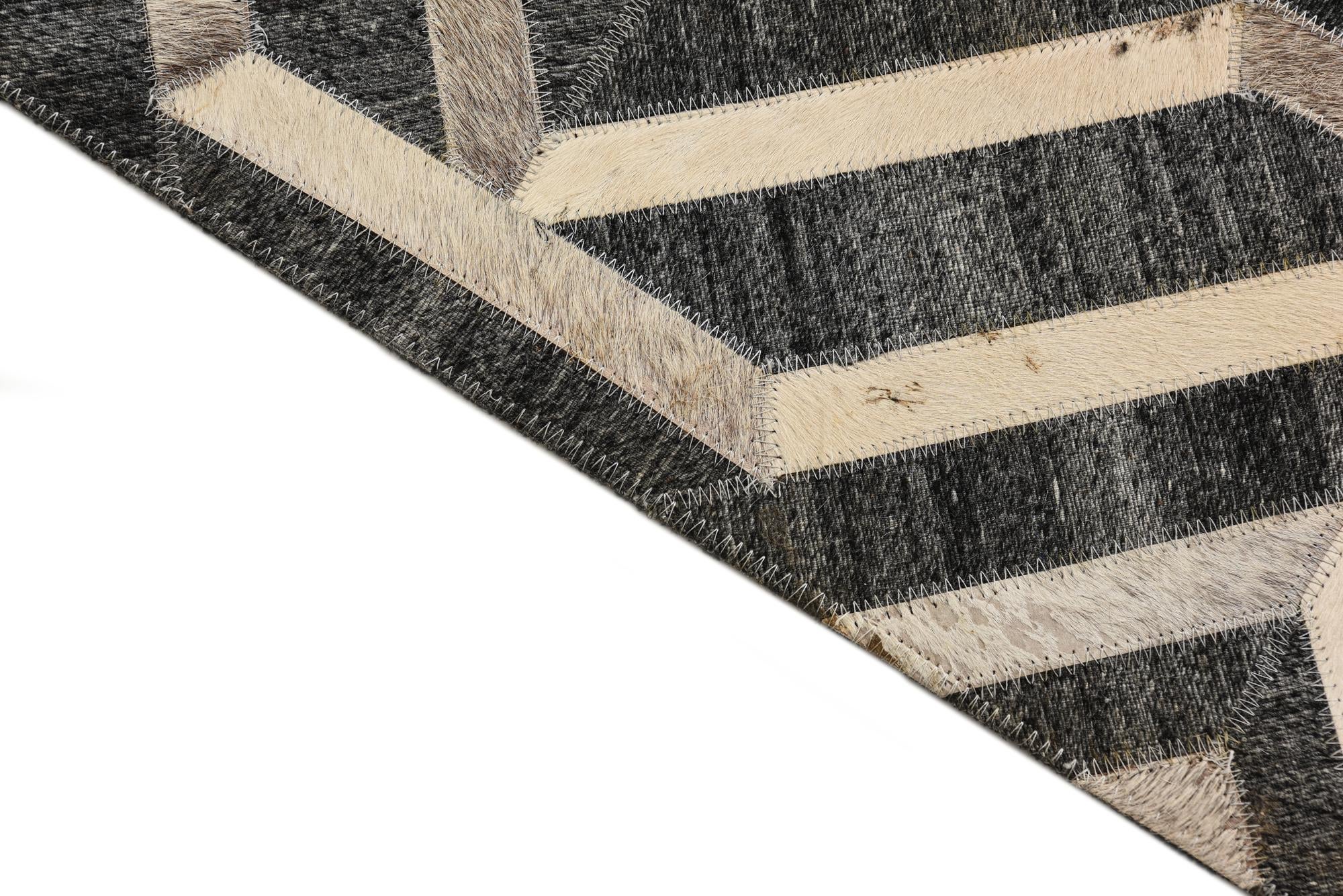 2' 2 x 3' 1 Cowhide Rug