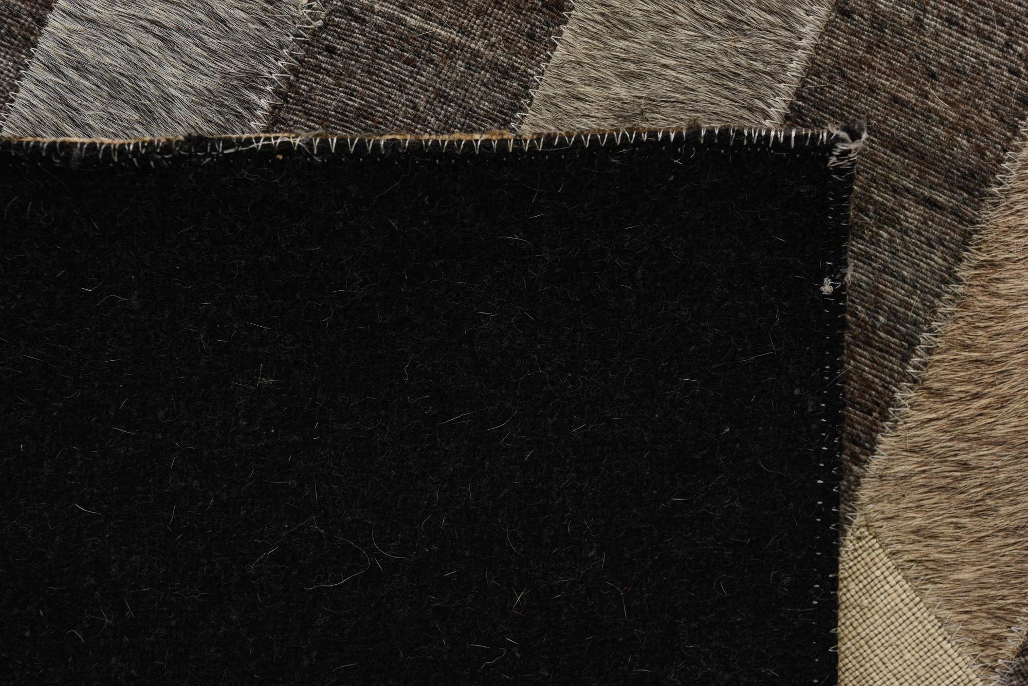 2' 1 x 3' 3 Cowhide Rug