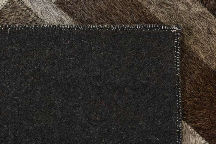 2' 1 x 3' 3 Cowhide Rug