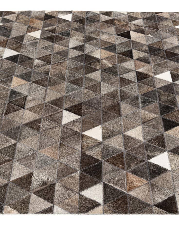 Detail image of 5' 1 x 8' 1 Cowhide Stocks Rug