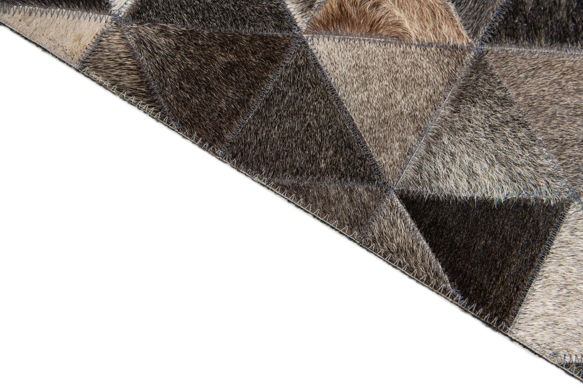 5' 1 x 8' 1 Cowhide Stocks Rug